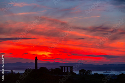 Silhouette of monuments on Calton Hill on beautiful sky on background  Edinburgh  Scotland