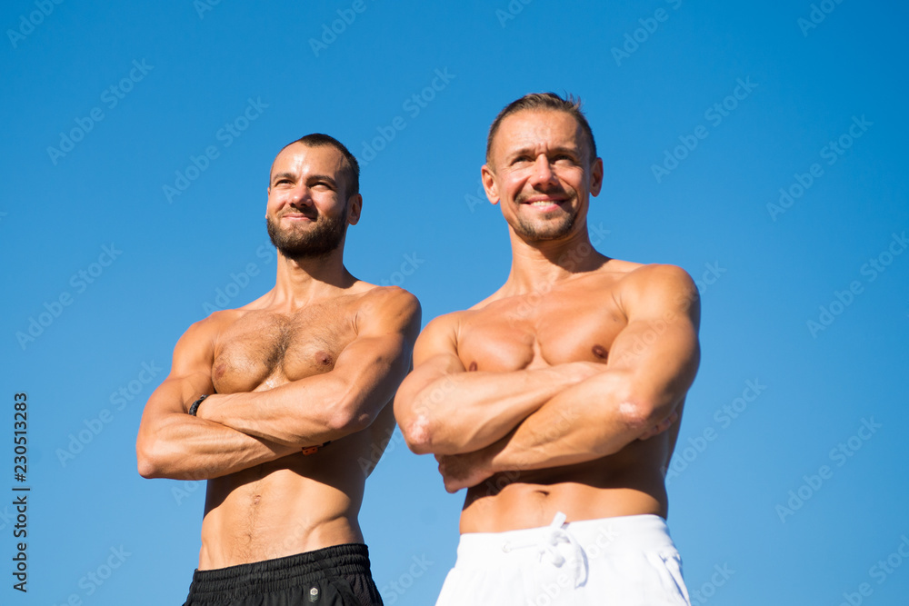Strong and powerful. Muscular men with six pack abs. Men enjoy good health. Sport and health care. Success in sport. Developing muscular strength and power. The price of success is hard work Strong and powerful. Muscular men with six pack abs. Men enjoy good health. Sport and health care. Success in sport. Developing muscular strength and power. The price of success is hard work