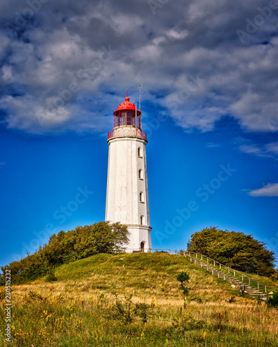 Old lighthouse Dornbusch on sunny summer day. Hiddensee  Baltic Sea.
