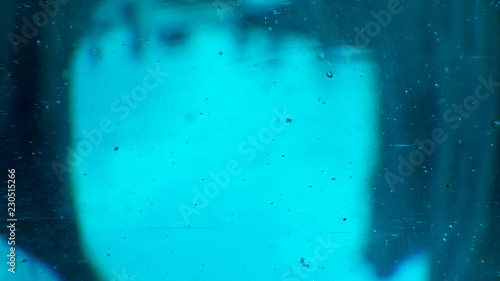 abstract background through blue glass