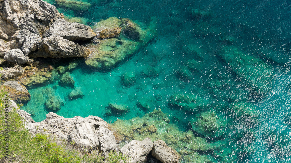 sea coast with green water sea coast with green water