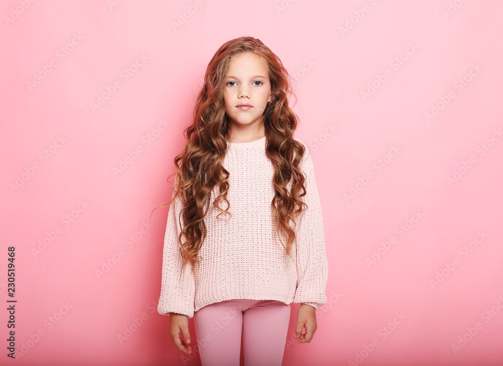lifestyle and people concept: litle girl kid with long curly hair lifestyle and people concept: litle girl kid with long curly hair