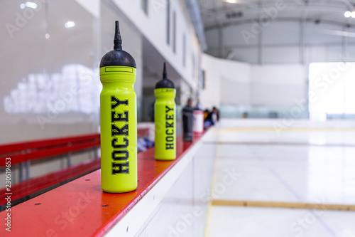 ice hockey rink, bottle on board