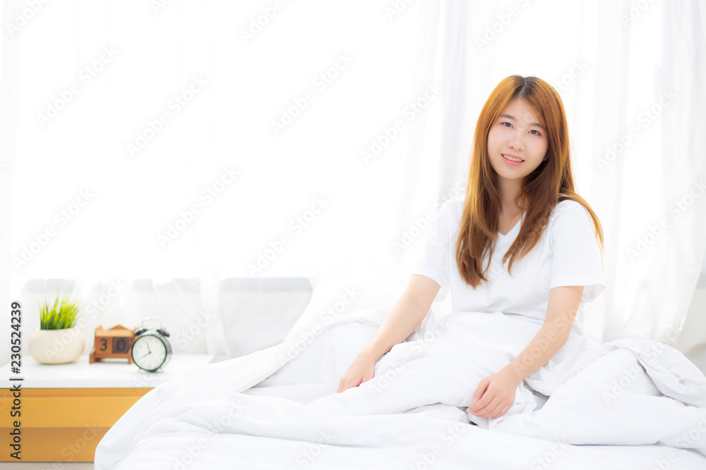Beautiful portrait young asian woman lying and smile while wake up with sunrise at morning, lifestyle and relax concept. Beautiful portrait young asian woman lying and smile while wake up with sunrise at morning, lifestyle and relax concept.