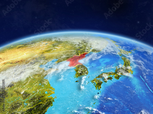 North Korea on planet Earth with country borders and highly detailed planet surface and clouds.