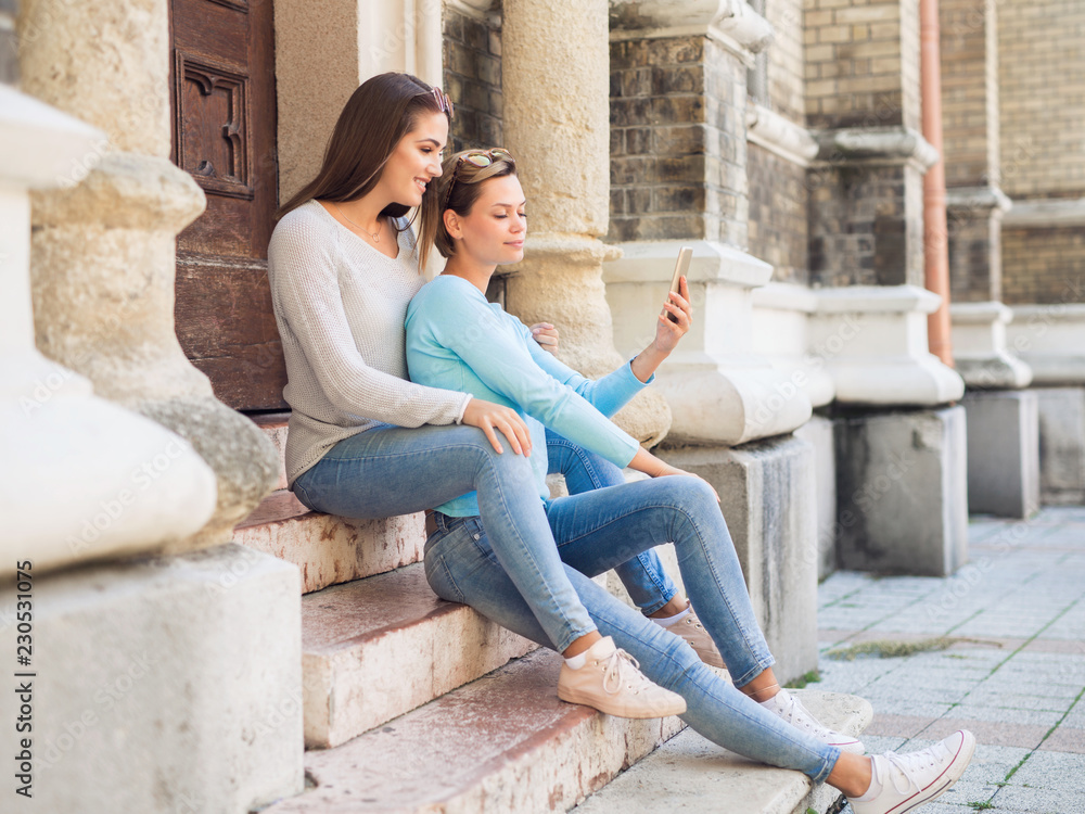 Two beautiful young women taking a selfie Two beautiful young women taking a selfie