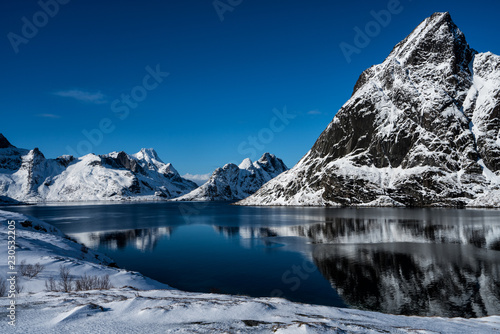 Beautiful snow covered mountains of the Lofoten Islands. Reine, Norway
