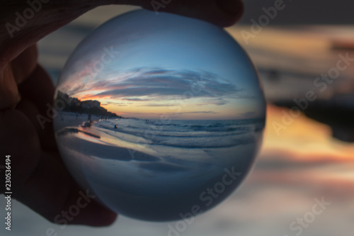 Fototapeta Naklejka Na Ścianę i Meble -  beach sunset lens ball