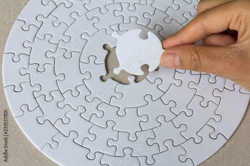 Obraz na plátne Jigsaw with one piece missing revealing,Comparative concept