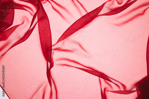 Abstract bright colorful fabric background in the form of a wave