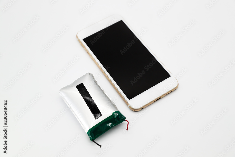 broken power bank with smart phone isolated and white background broken power bank with smart phone isolated and white background