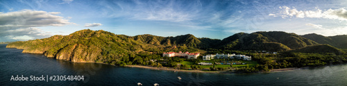 Aerial drone photo of resort hotels on the Pacific Ocean coastline of Costa Rica photo