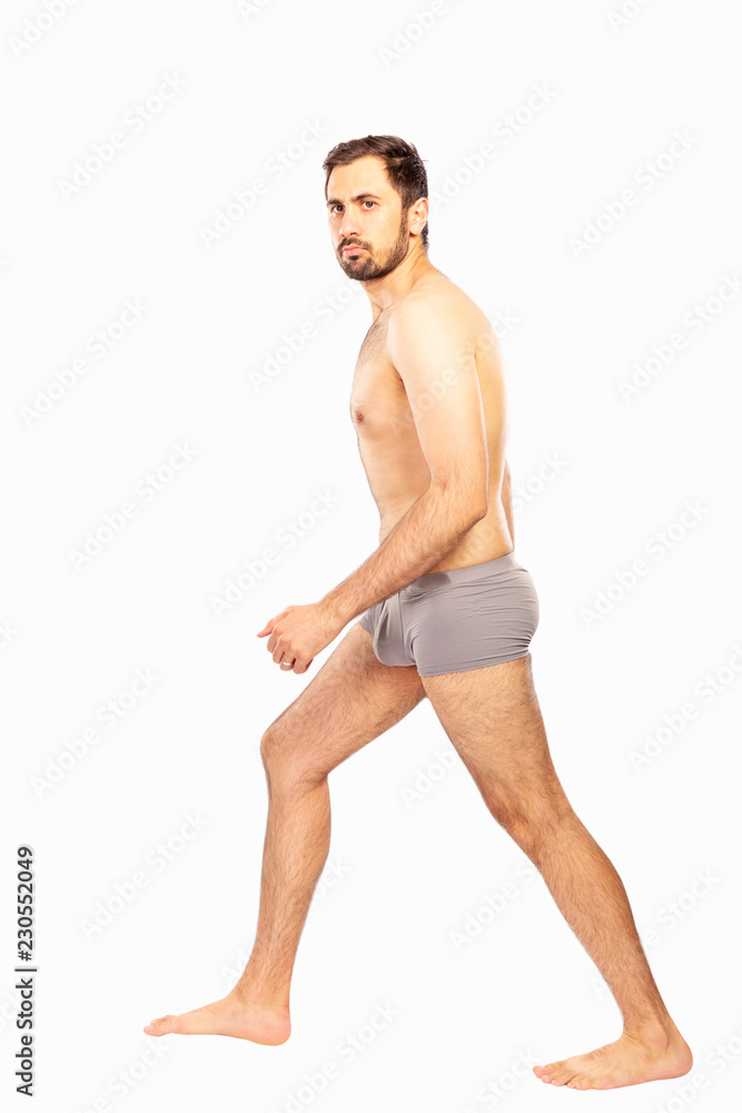 Undressed man full length isolated on white background Undressed man full length isolated on white background