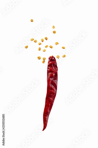 Close-up, Dried red chili or chilli cayenne peppers with Chili seeds isolated on white background.