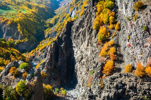 Incredible landscape - view of the mountain range with yellowed trees and gorges