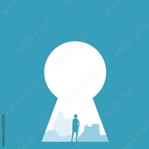 Posing young woman. Keyhole with woman silhouette. Mountains in fog