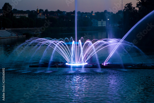Evening glowing musical fountain