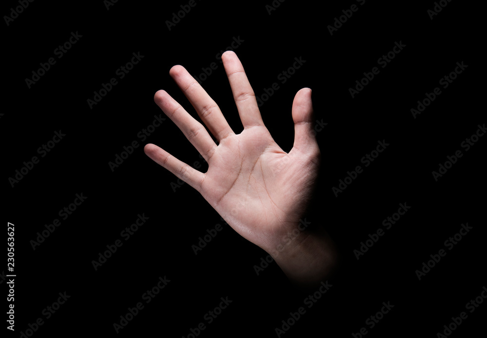 Male hand with open palm or five finger sign Male hand with open palm or five finger sign