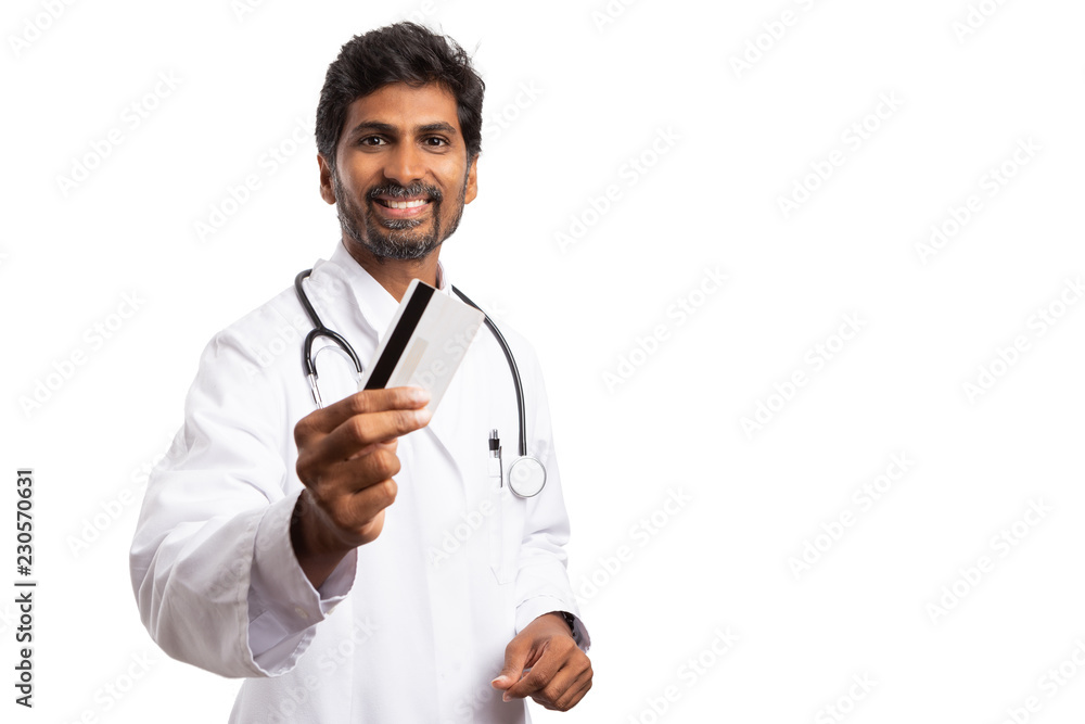 Indian physician showing debit or credit card . Indian physician showing debit or credit card .