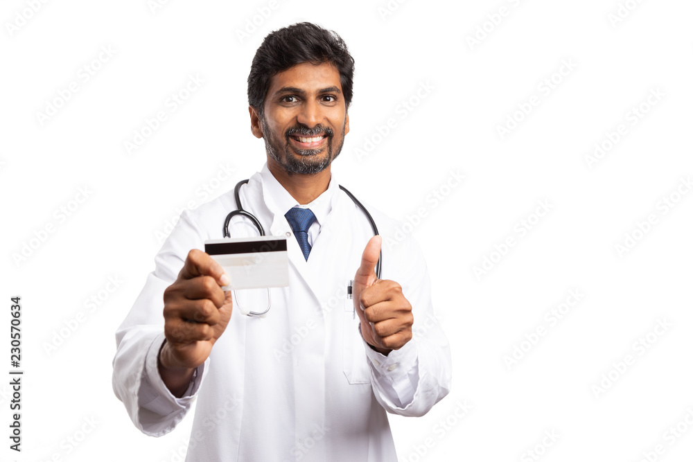 Medic recommending debit or credit card with thumb up. Medic recommending debit or credit card with thumb up.