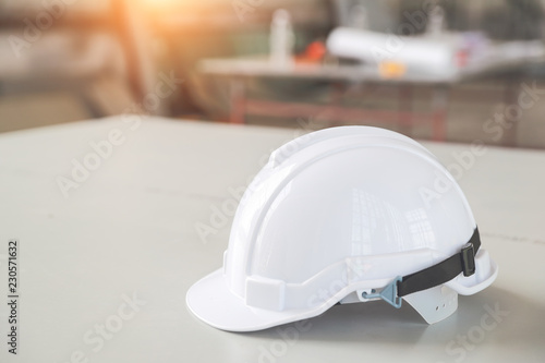 white safety helmet hat for worker and engineer at construction site