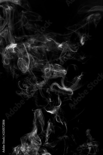 abstract white smoke in the air on a black background