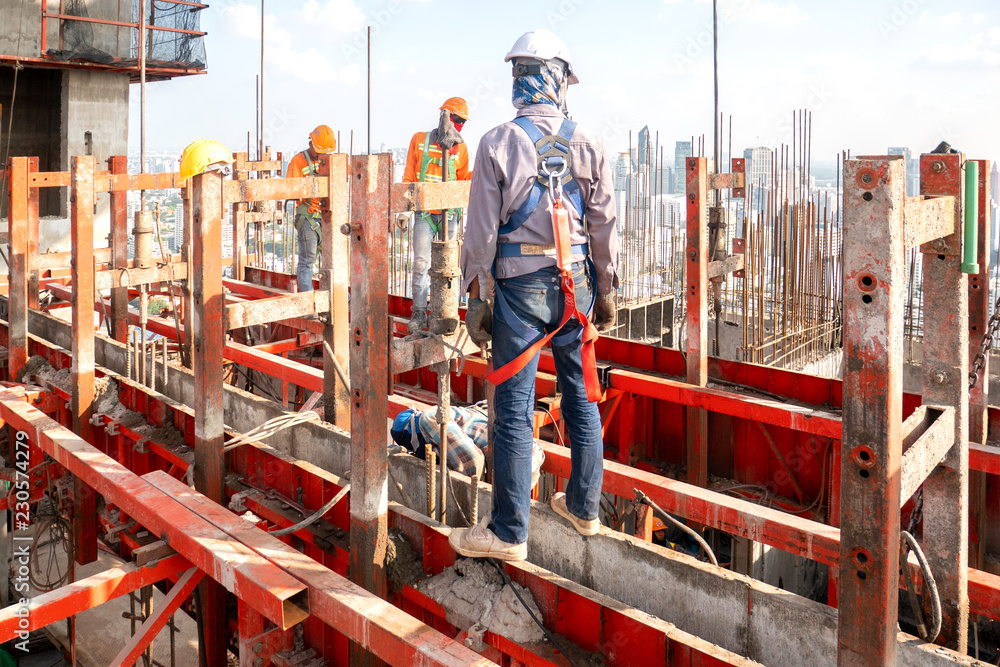 Construction worker wear standard personal protective equipment ...