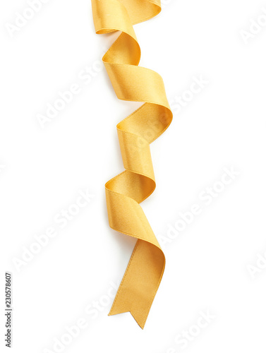 Beautiful golden ribbon on white background