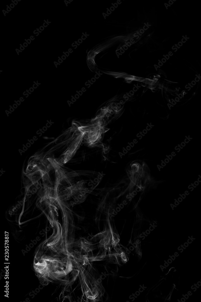 The abstract figure of the smoke on a black background The abstract figure of the smoke on a black background