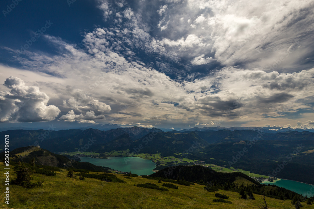 Mountain landscape on the top of the hiking trail to the Schafberg and view of beautiful landscape over the Wolfgang see lake. Salzkammergut region near Salzburg, Schafberg, Austria.