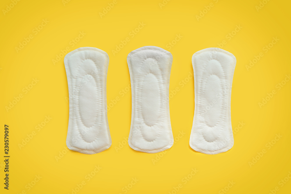 Menstrual pads on color background Menstrual pads on color background