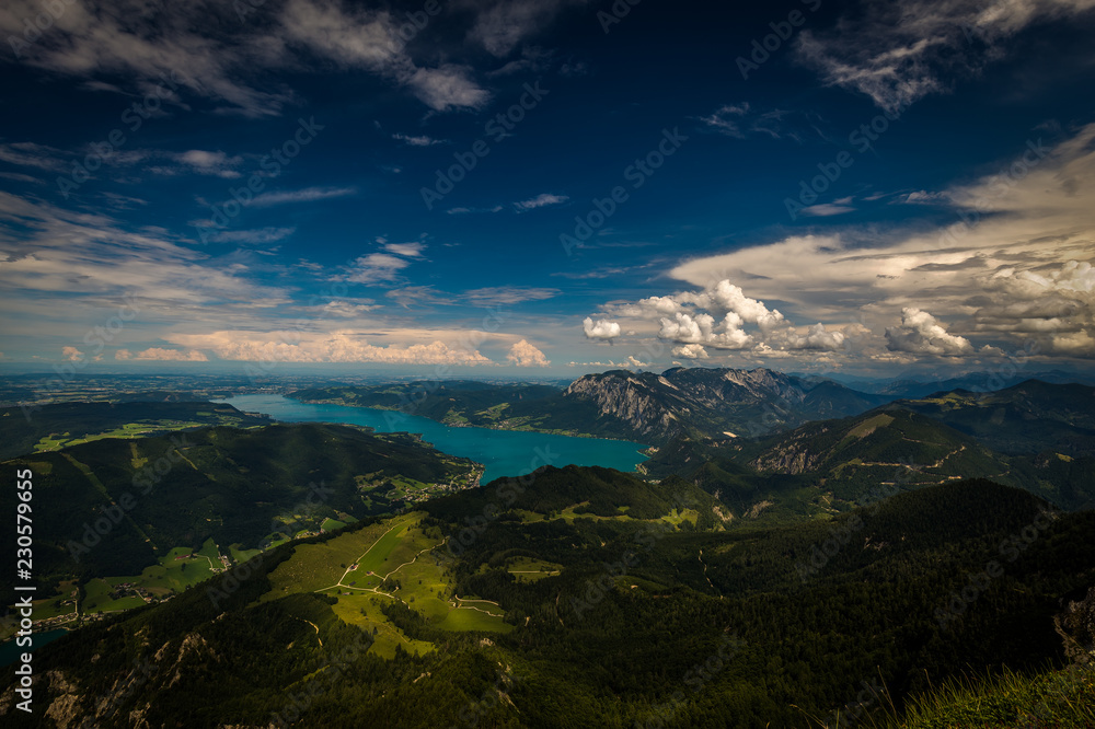 Mountain landscape on the top of the hiking trail to the Schafberg and view of beautiful landscape over the Mondsee lake. Salzkammergut region near Salzburg, Schafberg, Austria.