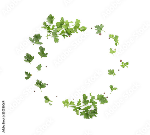 Frame made of fresh aromatic parsley on white background