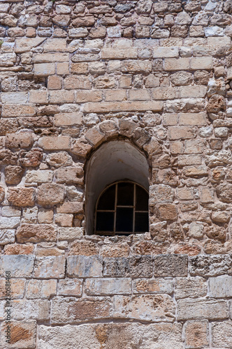 Arc window on ancient facade in Old Town Jerusalem Israel © YKD