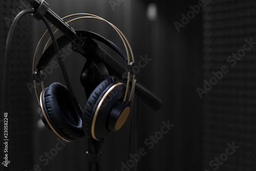 microphone and headphones on a black background