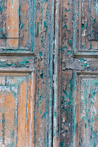 Old paint layers from different epochs on Venetian doors