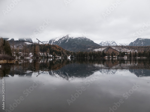Mirror on the lake. Mirroring on Strbské Pleso in the High Tatras. Mirroring in mountains. © Peter