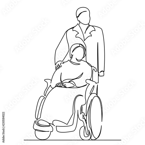 woman in a wheelchair with a doctor