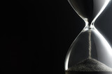 Hourglass on dark background