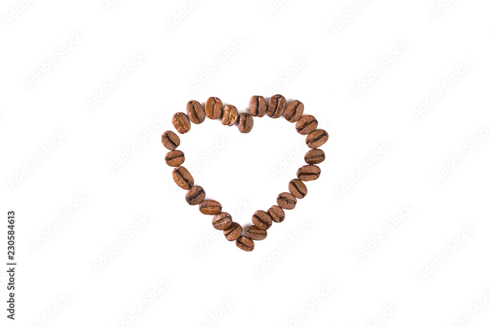 Outline heart made of coffee beans top view. Love coffee background isolated. Outline heart made of coffee beans top view. Love coffee background isolated.