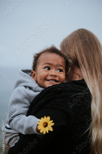 Mom with young son by the water