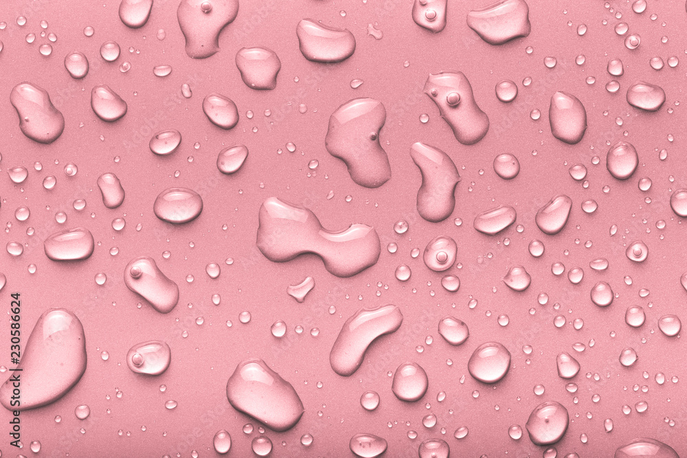 Drops of water on a color background. Pink. Toned Drops of water on a color background. Pink. Toned