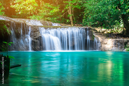 Erawan waterfall at tropical forest of national park, Thailand  photo