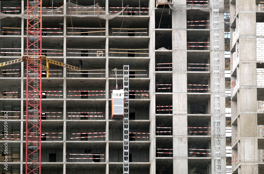 Process of construction modern apartment building wall front view with machinery Process of construction modern apartment building wall front view with machinery