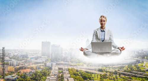 Woman float above city