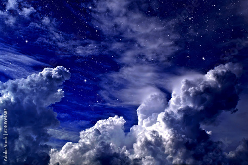 Fabulous starry sky and cumulus clouds