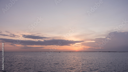 The sea and the pink sky at night