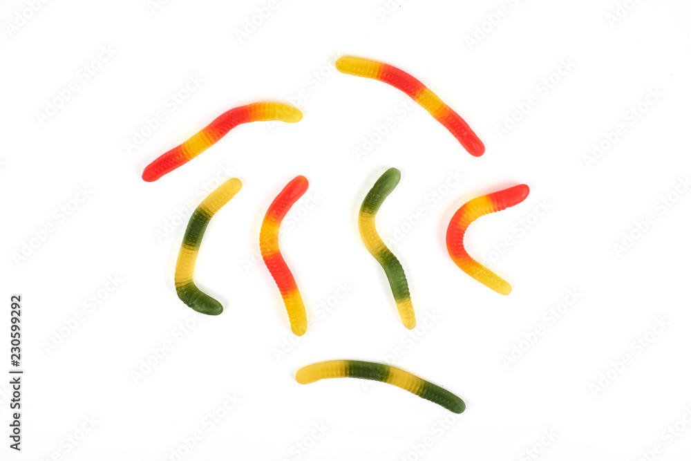Obraz premium gummy jelly worm candy on a white background.