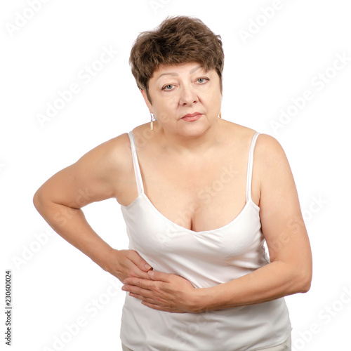 Beautiful woman aged senior of side ache stomach belly on white background isolation