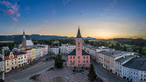 Panorama of Radków main square and Sudety mountains aerial view photo